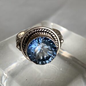 Silver Ring with Brilliant Blue Crystal Center